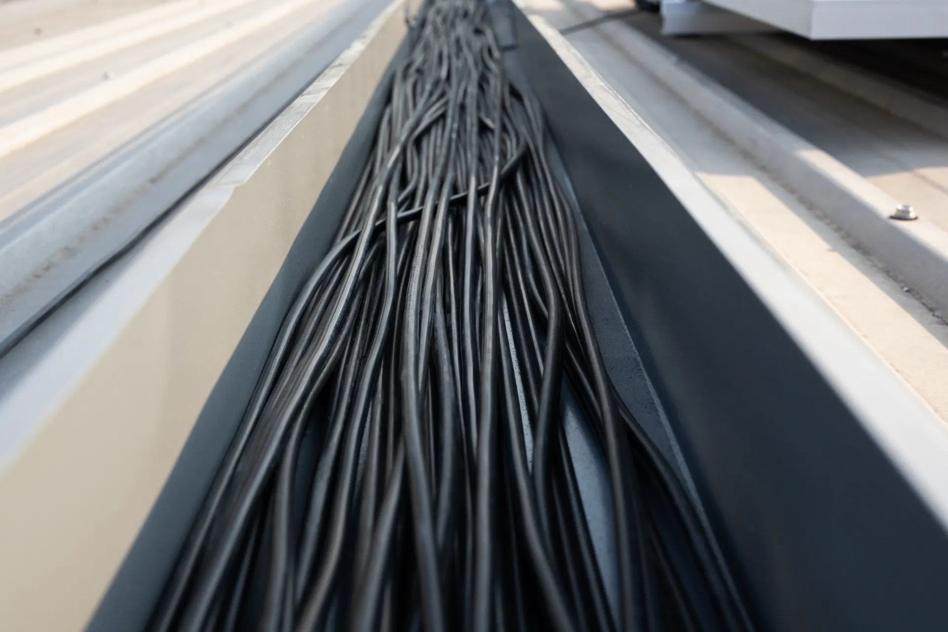 electric-cable-line-of-solar-cell-farm-power-plant-2024-10-11-00-13-02-utc