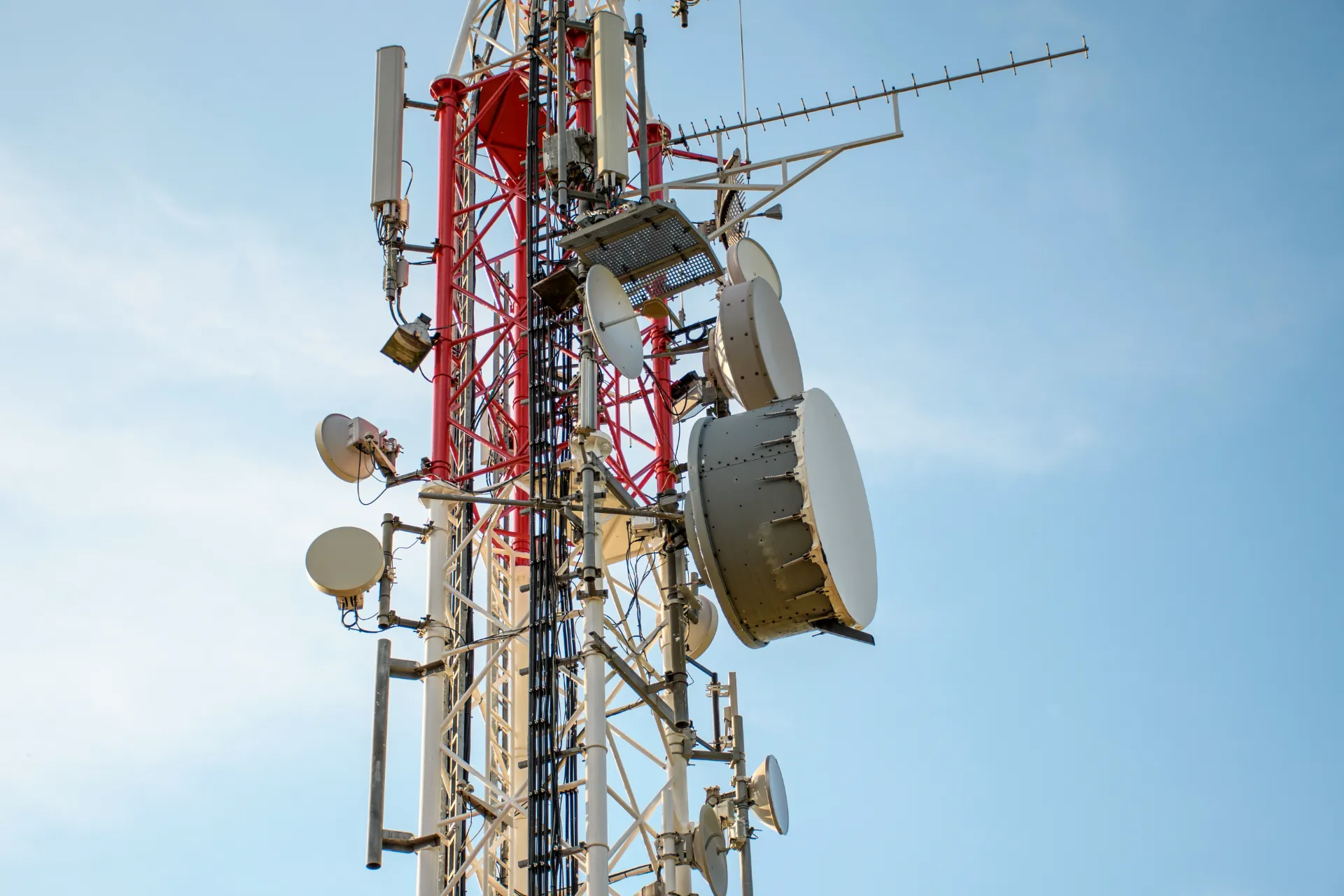 low-angle-view-of-antenna-tower-against-a-blue-sky-2025-03-08-08-23-12-utc